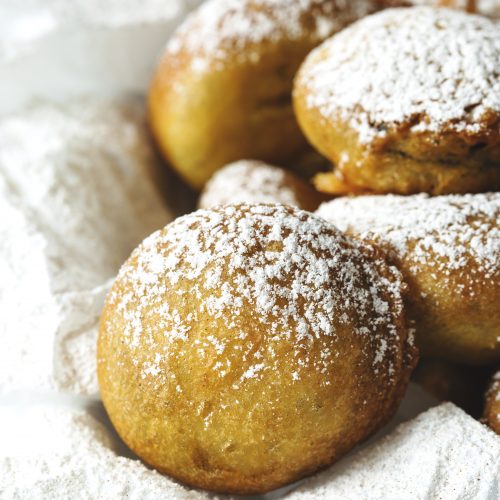 close up of fried Oreo with powdered sugar on top