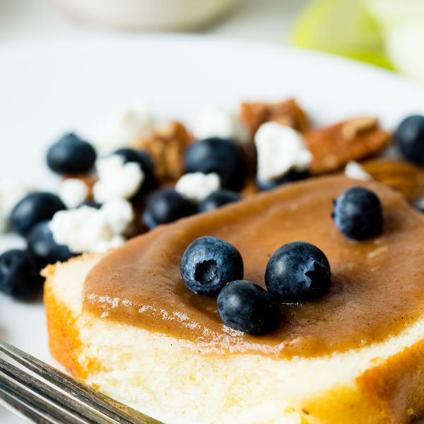 apple butter on bread with blueberries on top