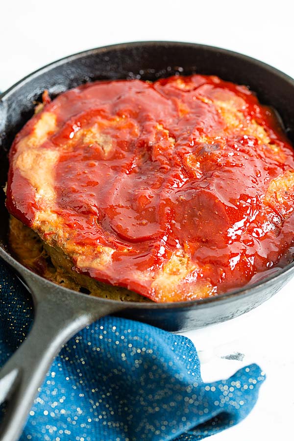 Baked Ground Turkey Meatloaf with spicy ketchup glaze in an 8-inch cast iron skillet.