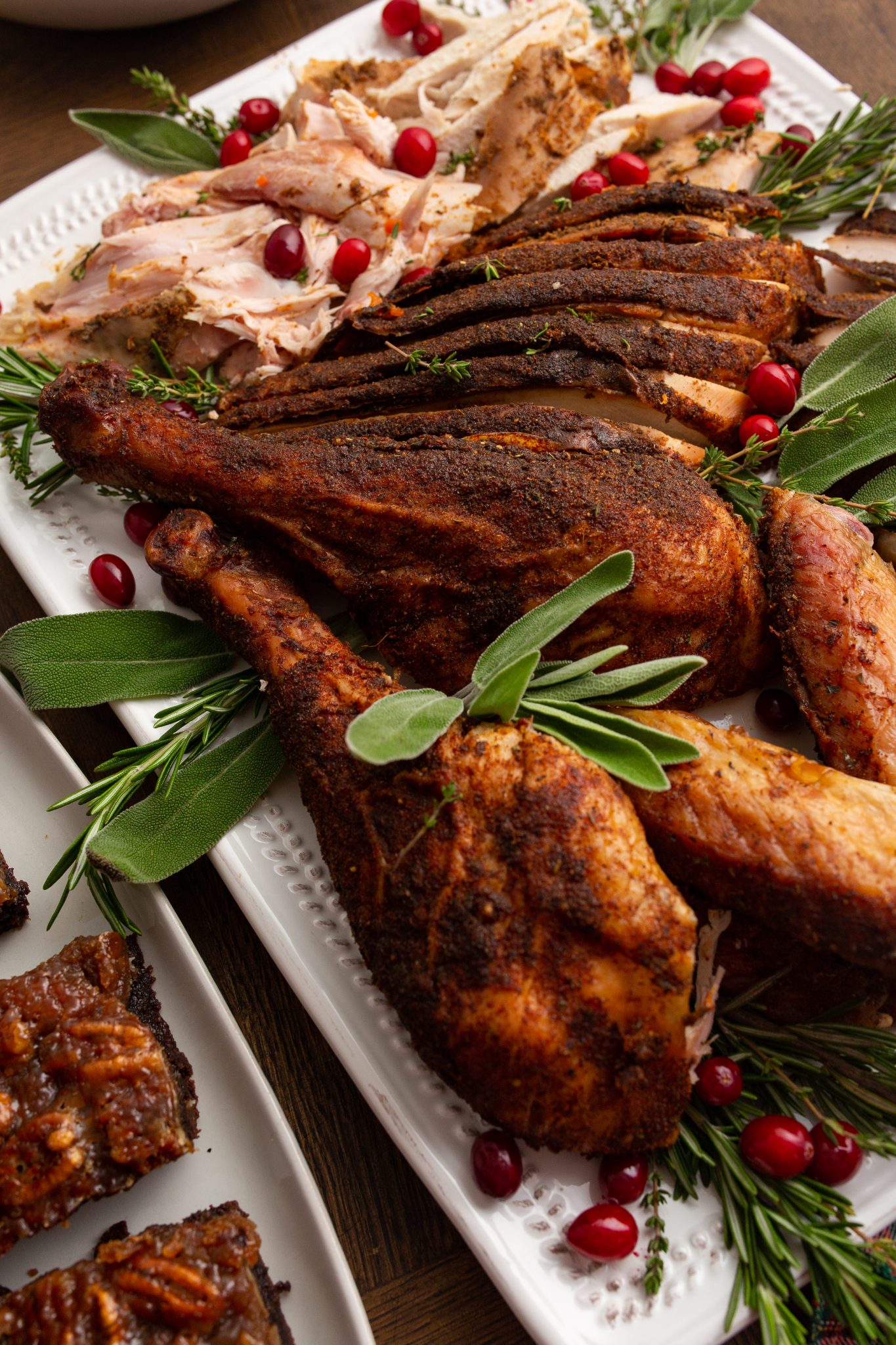 platter with smoked turkey legs and thanksgiving turkey white meat