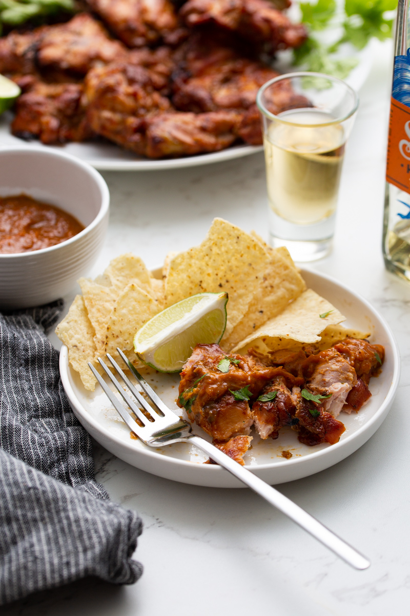 chipotle mango smoked chicken thighs with shots of tequila and chips