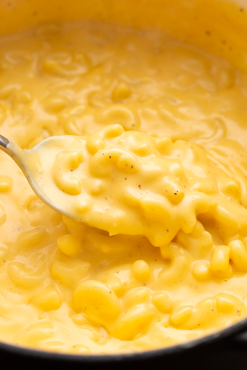 close up image of copycat kraft mac and cheese on a spoon